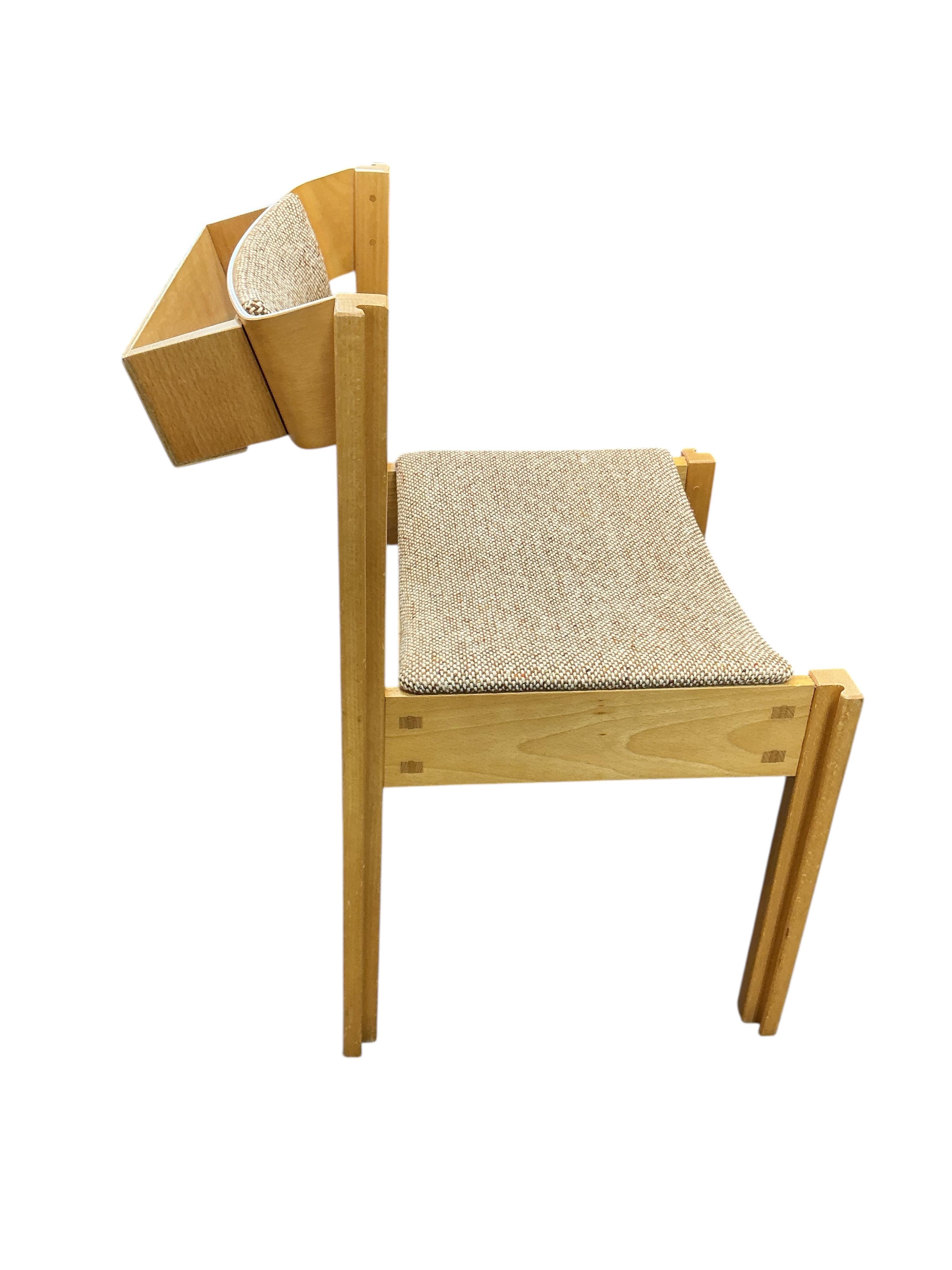 A set of six upholstered Clive Bacon linking chairs